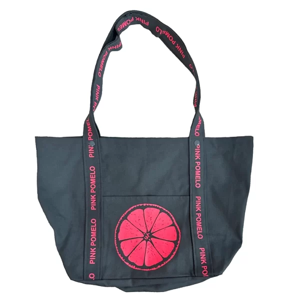 bolso de playa pink pomelo azul con print coral flúor en las asas y con rodaja de pomelo en bolsillo frontal. Cierre con clip